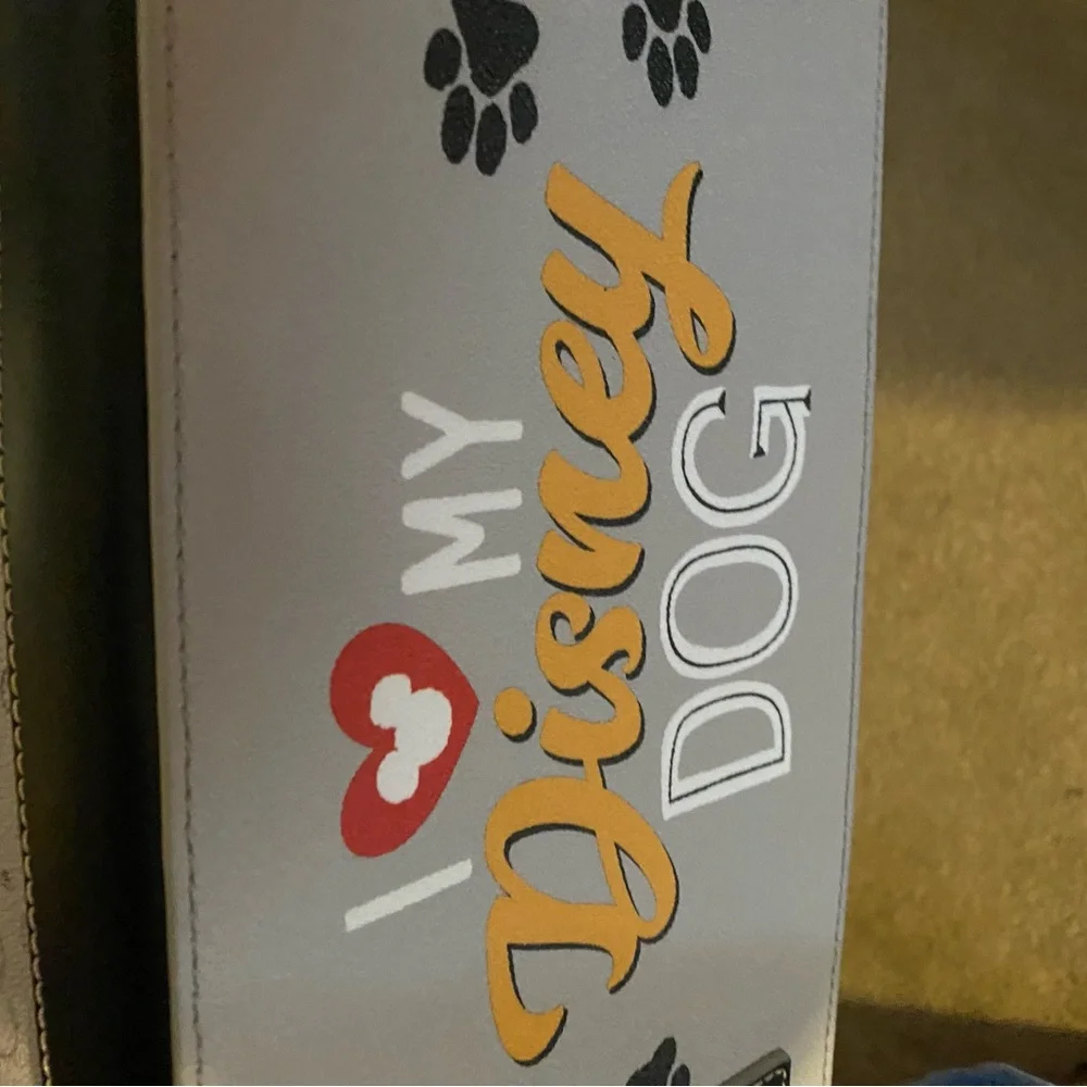 Dooney & Bourke Brown & White Spotted Dog Carrier